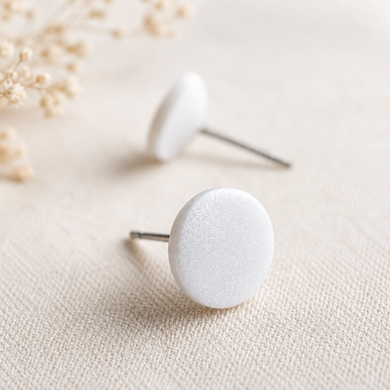The Micro Orb in Ivory Pearl | Circle Ear Stud