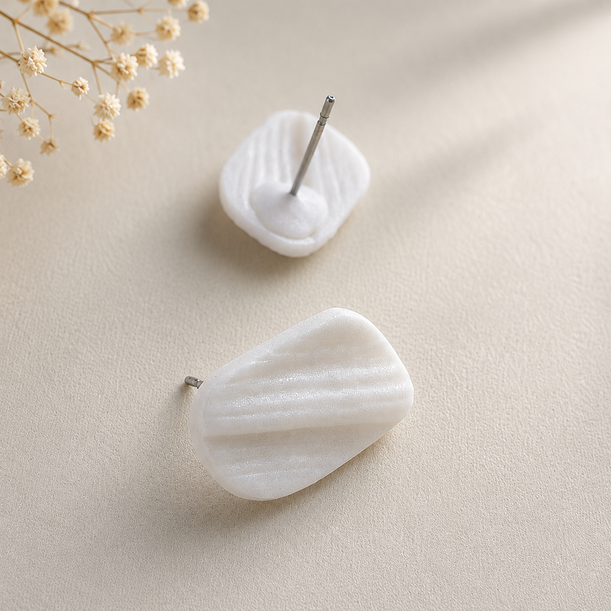The Organic Pebble in Ivory Pearl | Pebble Ear Stud