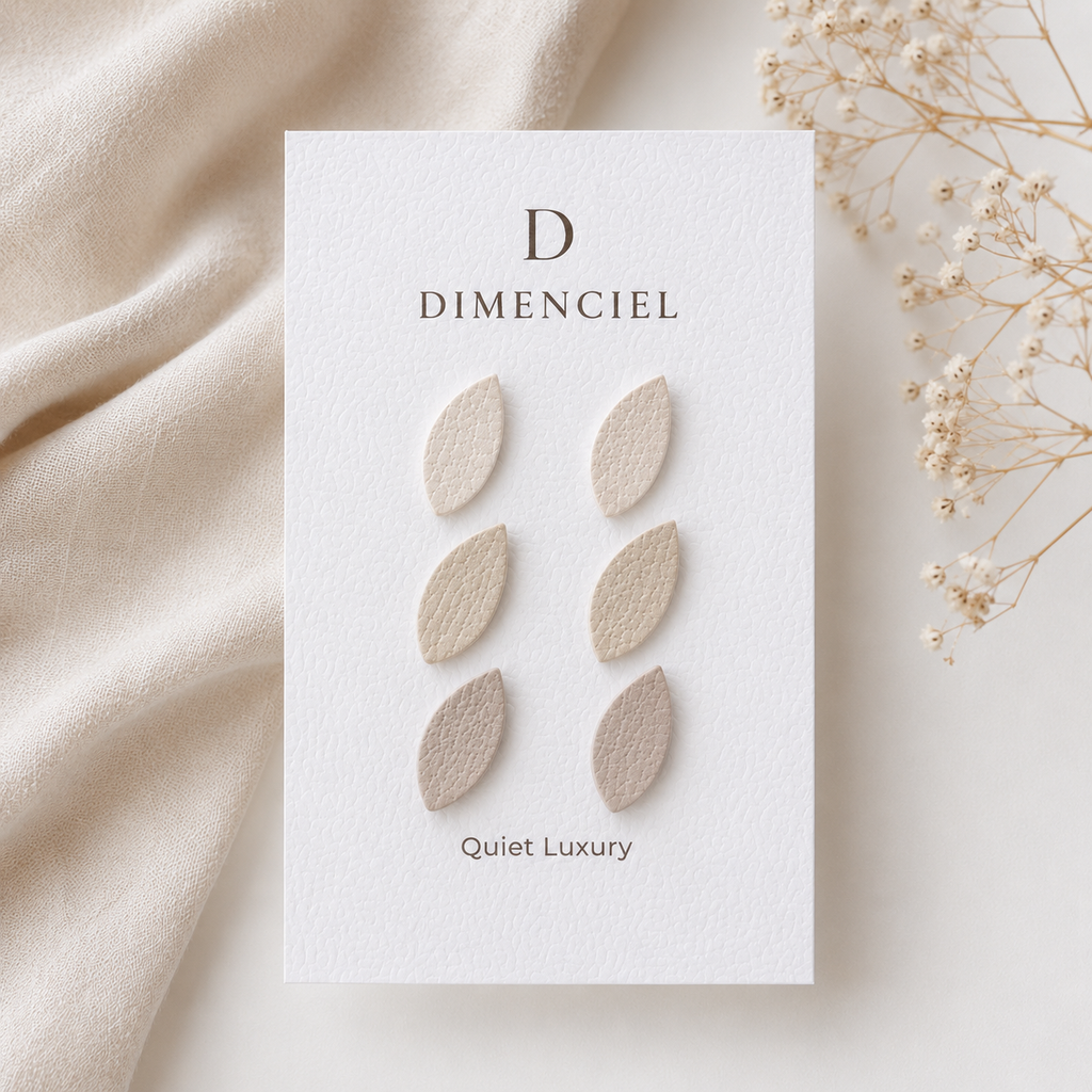 Quiet Luxury Leaf Ear Studs Set — three pairs in neutral tones on Dimenciel branded card