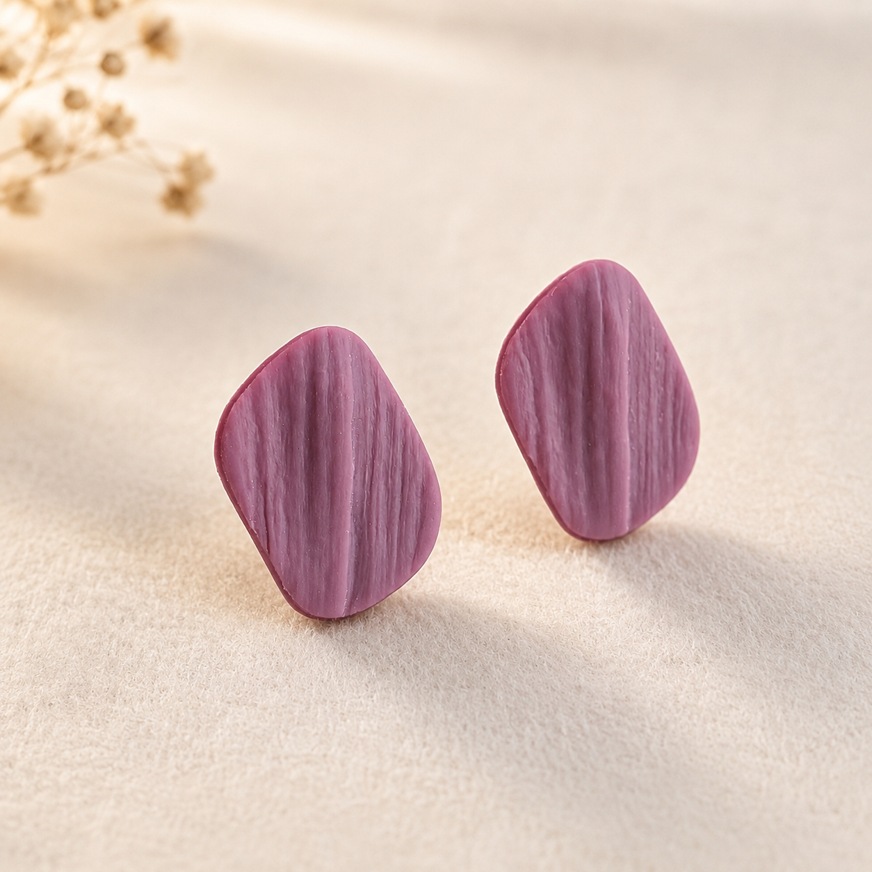 The Organic Pebble in Dusty Berry | Pebble Ear Studs
