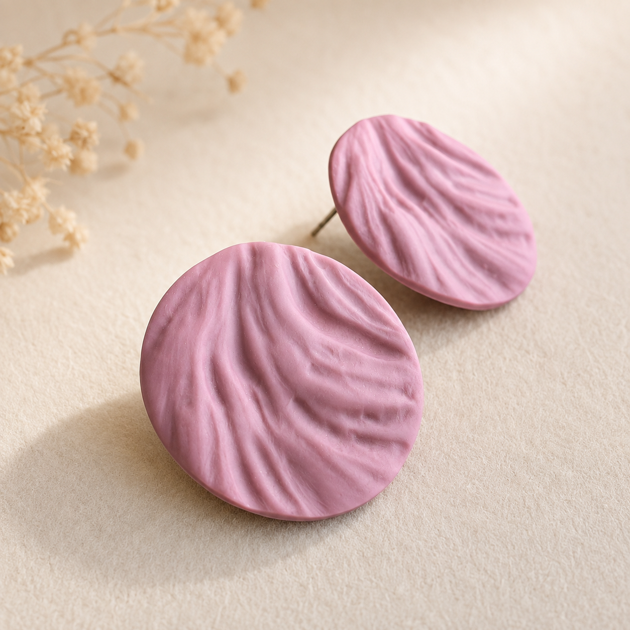 The Swirl Orb in Dusty Berry | Circle Ear Studs
