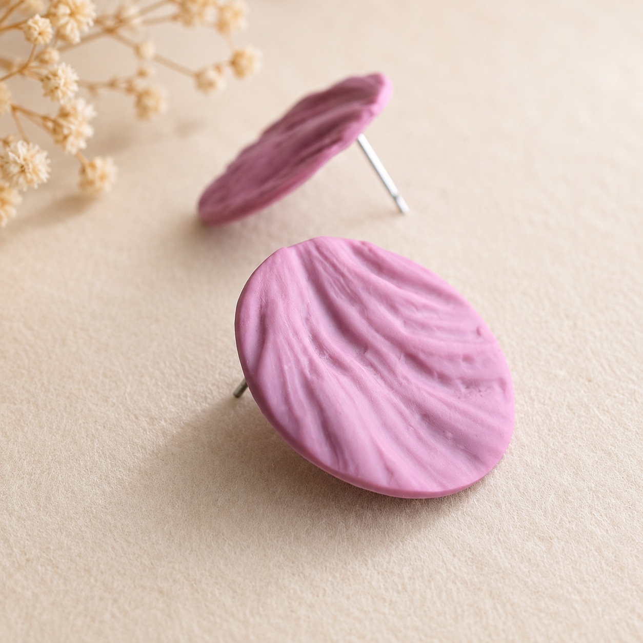The Swirl Orb in Dusty Berry | Circle Ear Studs