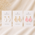 Modern Wedding Petal Drop Earrings — three cards showing Pearl White, Champagne and Blush Champagne petal drop earrings with gold-tone ball studs