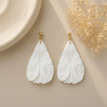 Flat lay earring pair