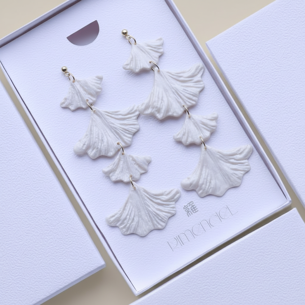 Pearl white ginkgo earrings